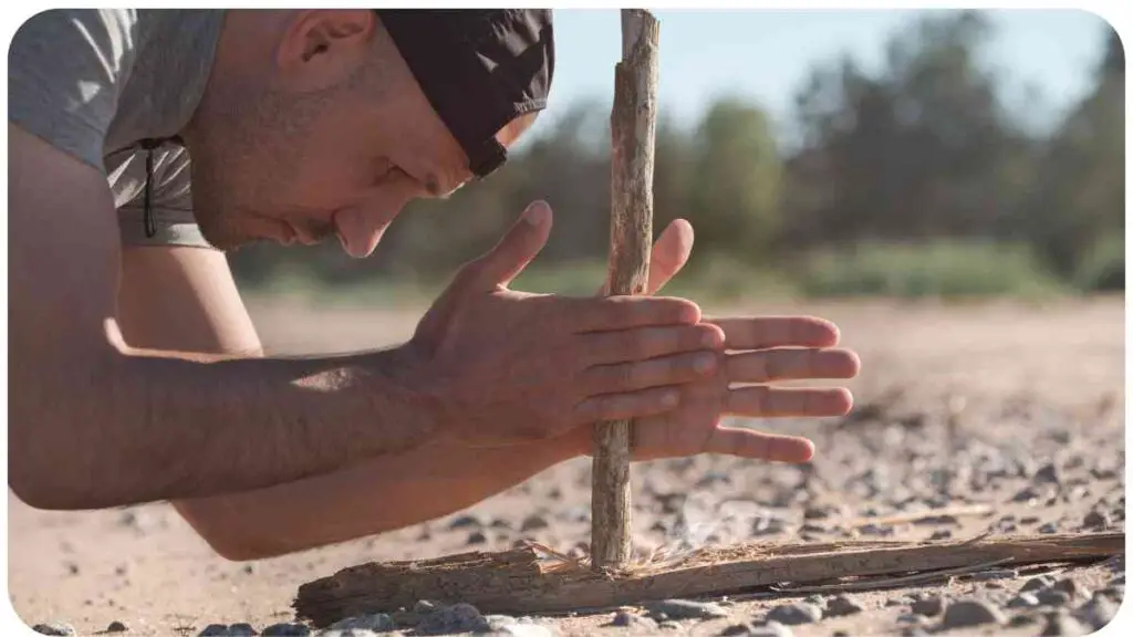 a person bending over to pick up a stick