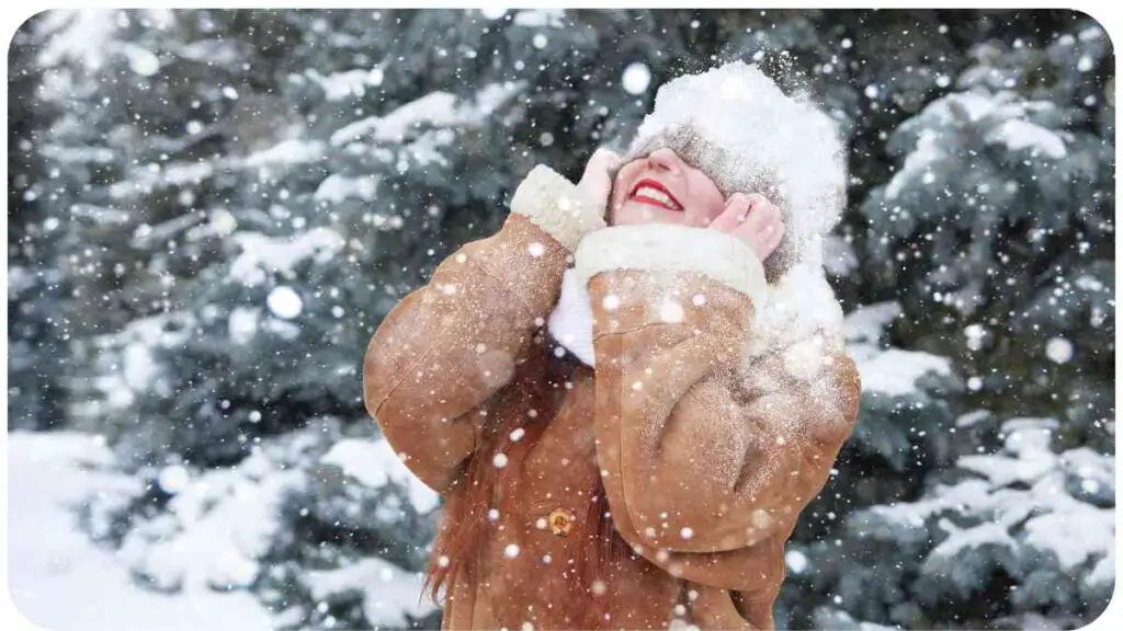 a person wearing a fur coat in the snow