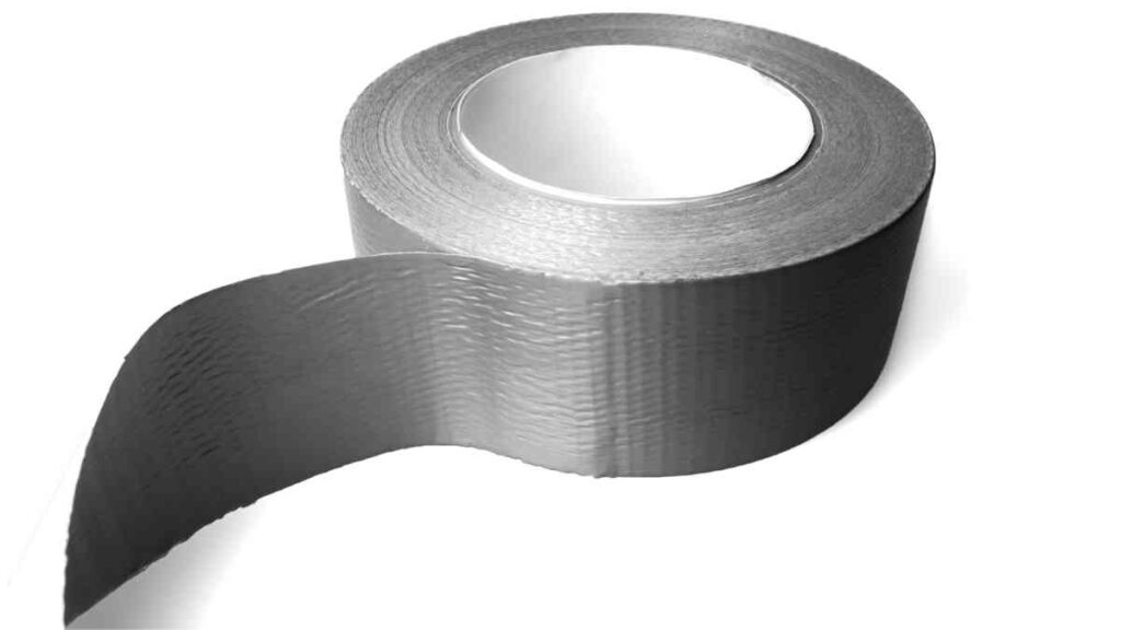 a roll of silver duct tape on a white background